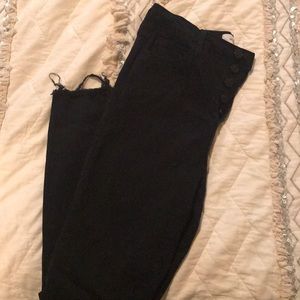 Black button fly jeans